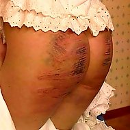 School girl shackled over her desk and relentlessly caned on her bare ass